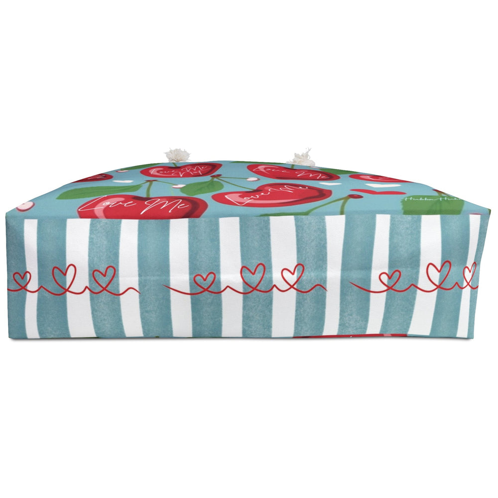 This is an image of the bottom of the bag with heart curlicue graphics in red.