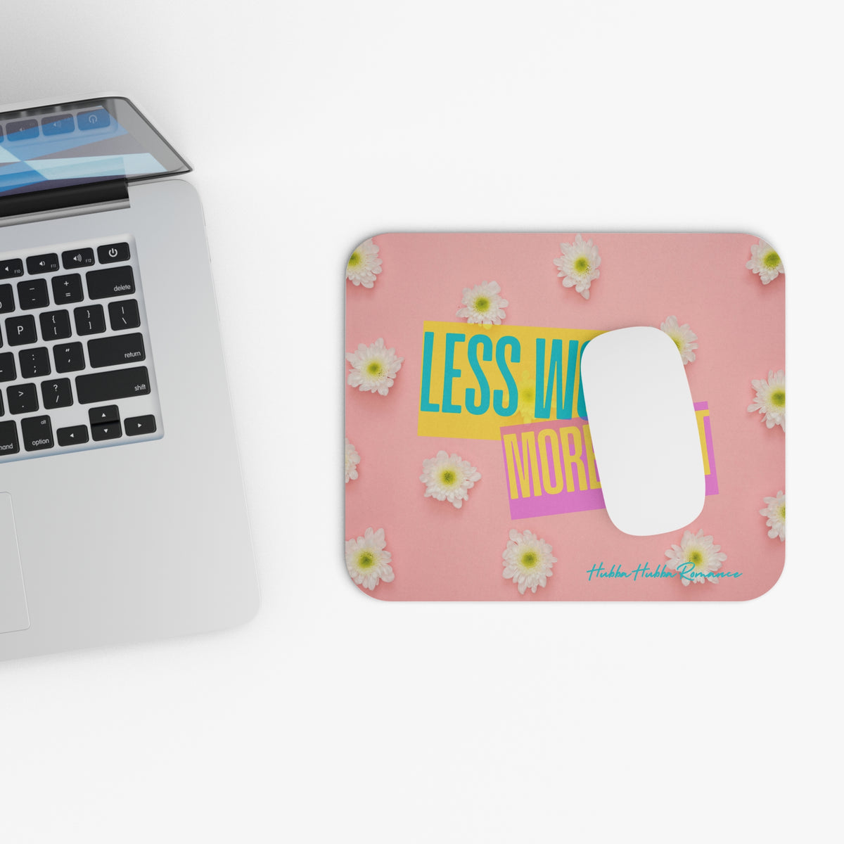 Picture showing mouse pad in relationship to keyboard for sizing reference.

