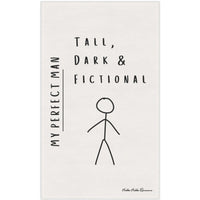 An off-white kitchen towel featuring an image of a male stick figure along with the words: My Perfect Man. Tall, Dark, and Fictional.
