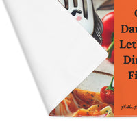 The placemat is folded over at the left corner to show the white cotton backing.
