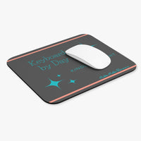 The mousepad is displayed with a computer mouse on it for reference.
