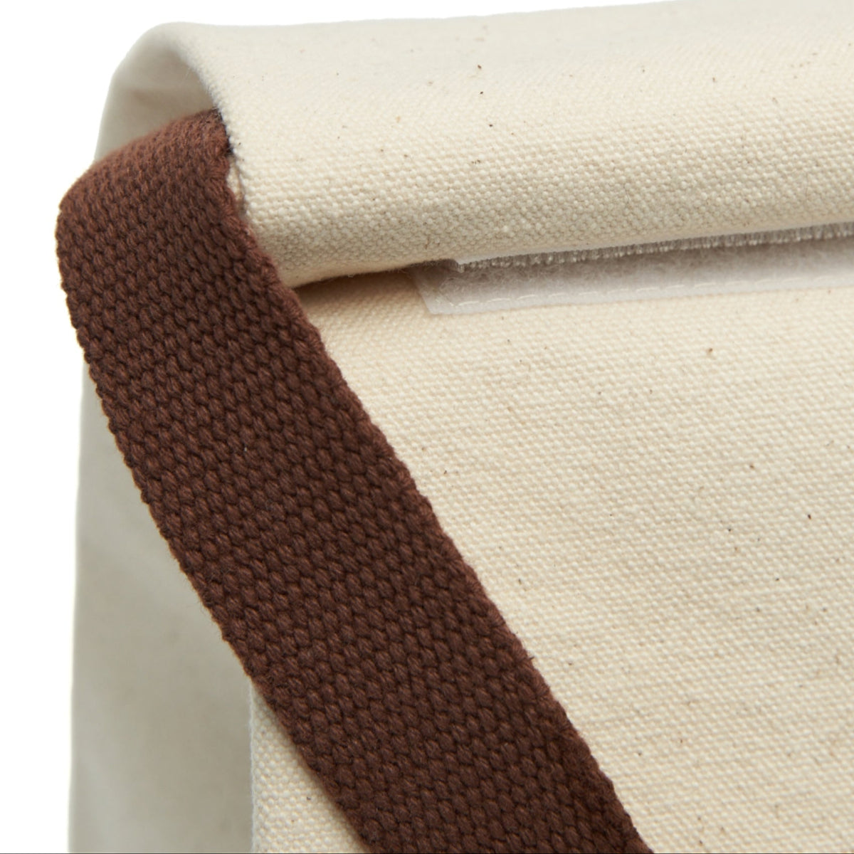 Close-up of the bag closure involving a rollover of the top edge secured by Velcro.