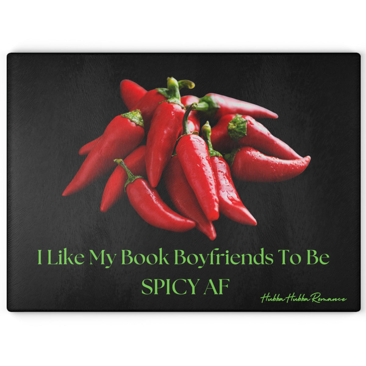 Glass cutting board with a black background featuring a pile of bright red chili peppers at the center. Below the image, lime green text reads: “I Like My Book Boyfriends To Be SPICY AF.” Made from durable, textured tempered glass with non-slip rubber feet, perfect for meal prep or as a bold kitchen accent. This is the larger size.