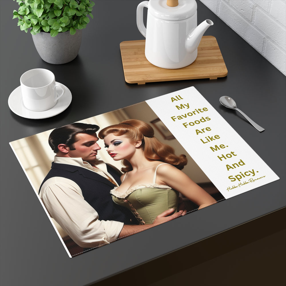 The placemat is displayed on a table with a cup and saucer, a teapot, a plant, and a spoon for context.
