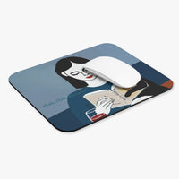 The mouse pad is displayed with a computer mouse on it for reference.
