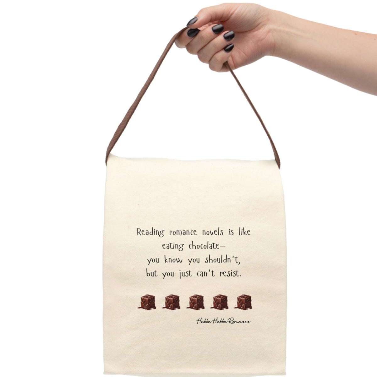 The lunch bag is displayed with it being held by a person, with only the hand and arm visible.
