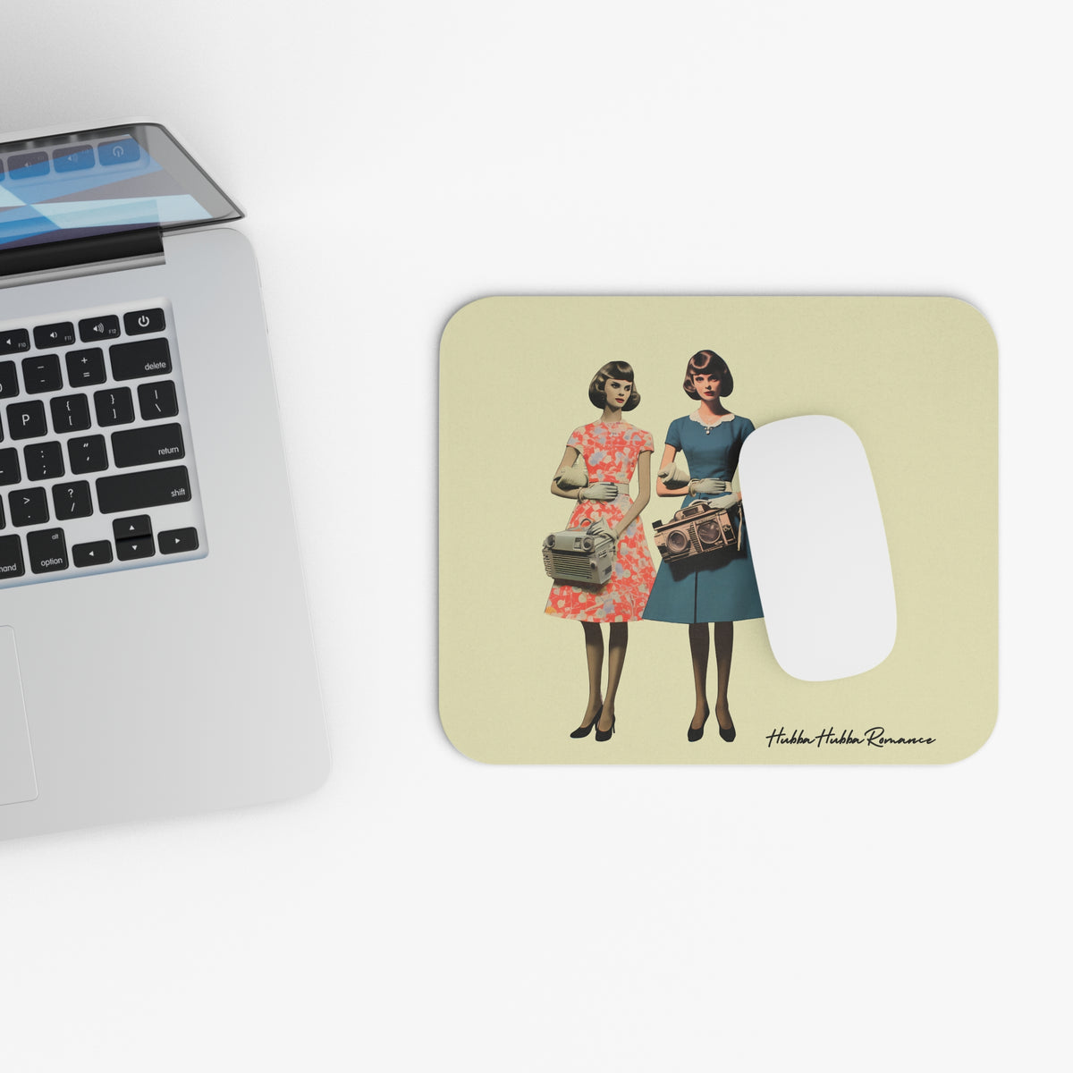 Picture showing mouse pad in relationship to keyboard for sizing reference.

