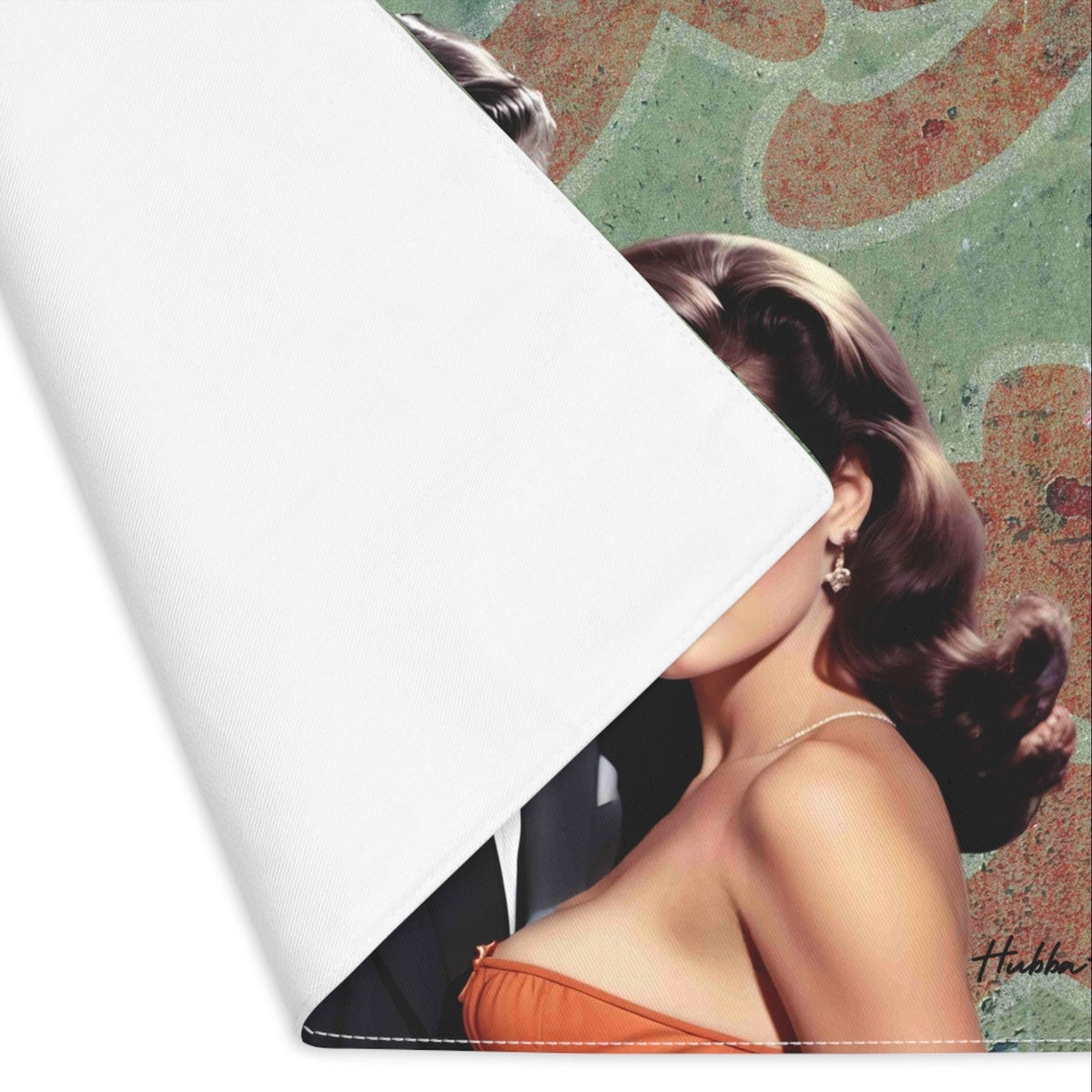The placemat is folded over at the left corner to show the white cotton backing.