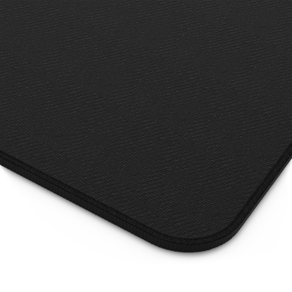 This is the corner of the back of the desk mat, showing the 100% neoprene construction.