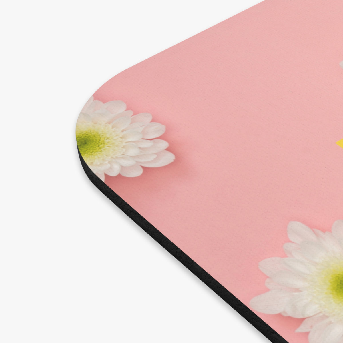 Picture showing close-up edge of mouse pad.
