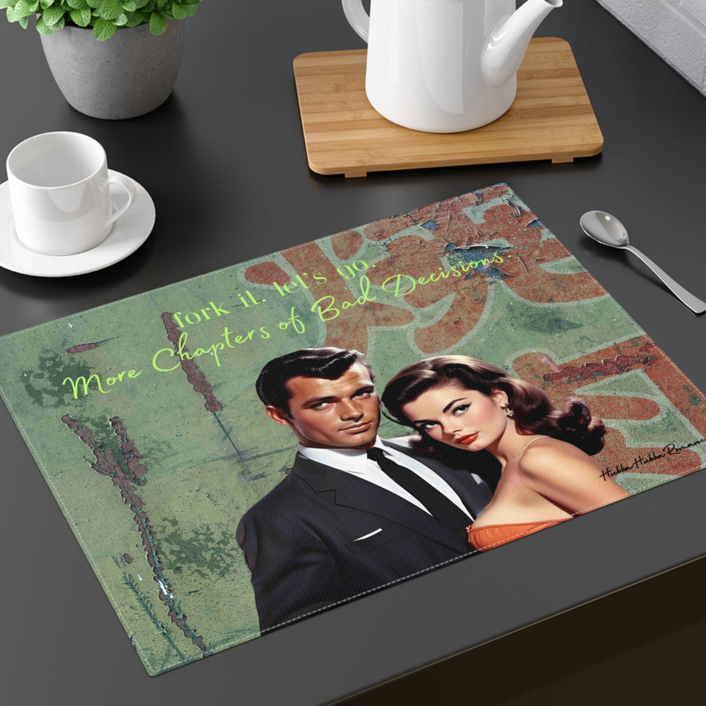 
The placemat is displayed on a table with a cup and saucer, a teapot, a plant, and a spoon for context.


