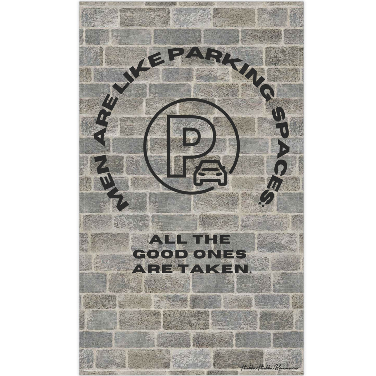 The image depicts a cotton kitchen towel with a vintage-style design, set against a textured brick wall background. At the top, arched black text reads: "Men Are Like Parking Spaces." Below, a circular stamp-like emblem resembles a classic parking permit, with a distressed, worn effect. The stamp has bold block letters and a faded appearance, enhancing its retro feel. Beneath the stamp, additional black text reads: "All the Good Ones Are Taken." The combination of the brick texture and faded stamp design gi