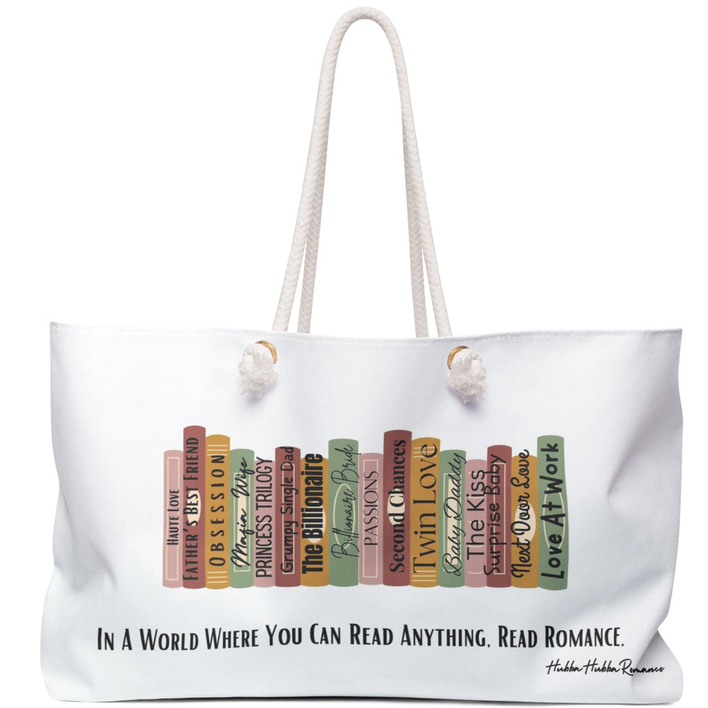Image features a stylized row of romance book spines with playful titles including “Grumpy Single Dad,” “Surprise Baby,” “The Billionaire,” and more. Below the books is bold black text that reads: “In a world where you can read anything, read romance.” The design is colorful, cheeky, and celebratory of romance novels and their tropes. Displayed on a weekender bag, the artwork appeals to passionate readers who love their stories spicy, dramatic, and unapologetically feel-good.

