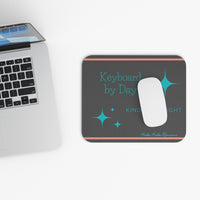 Picture showing mouse pad in relationship to keyboard for sizing reference.


