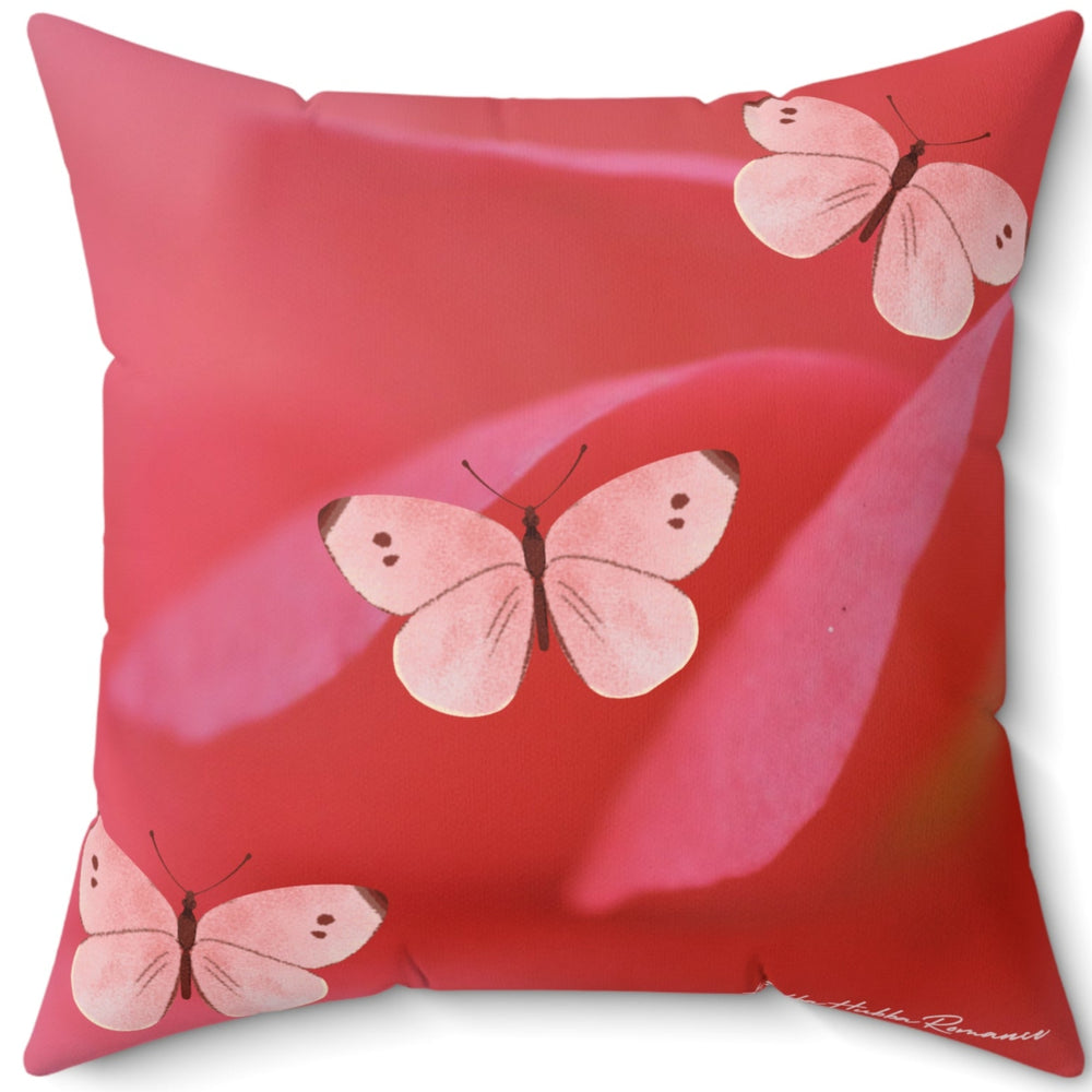 The back side of the pillow is the same color palette as the front but instead of one large butterfly, there are three smaller ones.