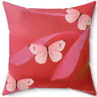 The back side of the pillow is the same color palette as the front but instead of one large butterfly, there are three smaller ones.