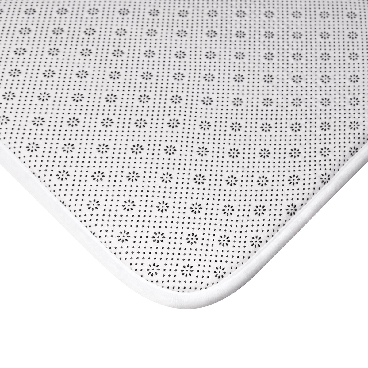 The mat's anti-slip backing is displayed.