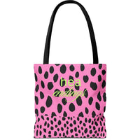 Image shows a pink background with bold, irregular black leopard spots. On one half of the image, the words “fictional heartbreaks” are written in light green cursive and block letters. Flipped upside down on the other half is the word “HEA” in matching green, also in mirrored script and block lettering. The design is playful and reversible, representing the highs and lows of romance reading. This double-sided tote is perfect for book lovers navigating love, loss, and happy endings.