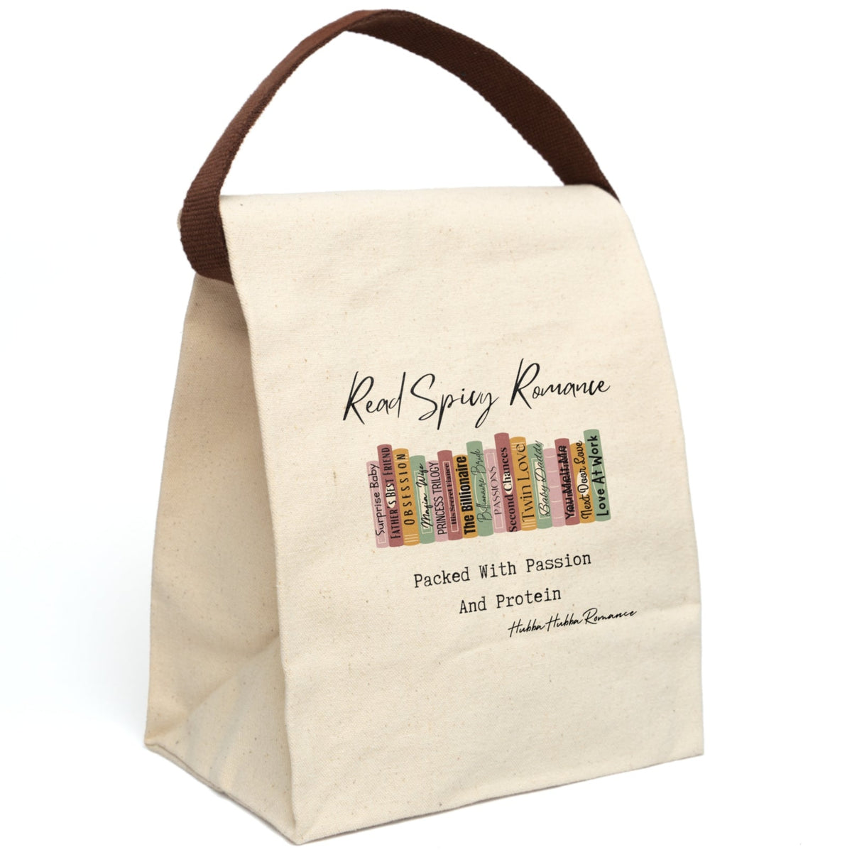 This canvas lunch bag features an illustrated row of romance book spines in muted earth tones, each labeled with tropes or titles like “Surprise Baby,” “Obsession,” “His Secret Fiancé,” “Twin Love,” and “Next Door Love.” Above the books, flowing script reads “Read Spicy Romance.” Below, in bold typewriter-style font, it says: “Packed With Passion And Protein.” The design blends a cheeky tone with a love for books. Bag includes canvas carrying strap, displayed upright, and roll-top closure.