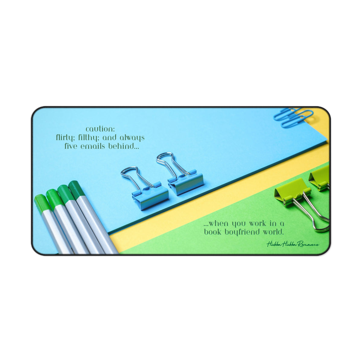 A colorful flat-lay image of bright blue, green, and yellow office supplies—binder clips, pens, and folders. The top text reads, “Caution: flirty, filthy, and always five emails behind.” Bottom text says, “working girl life in a book boyfriend world.” This is the large version.