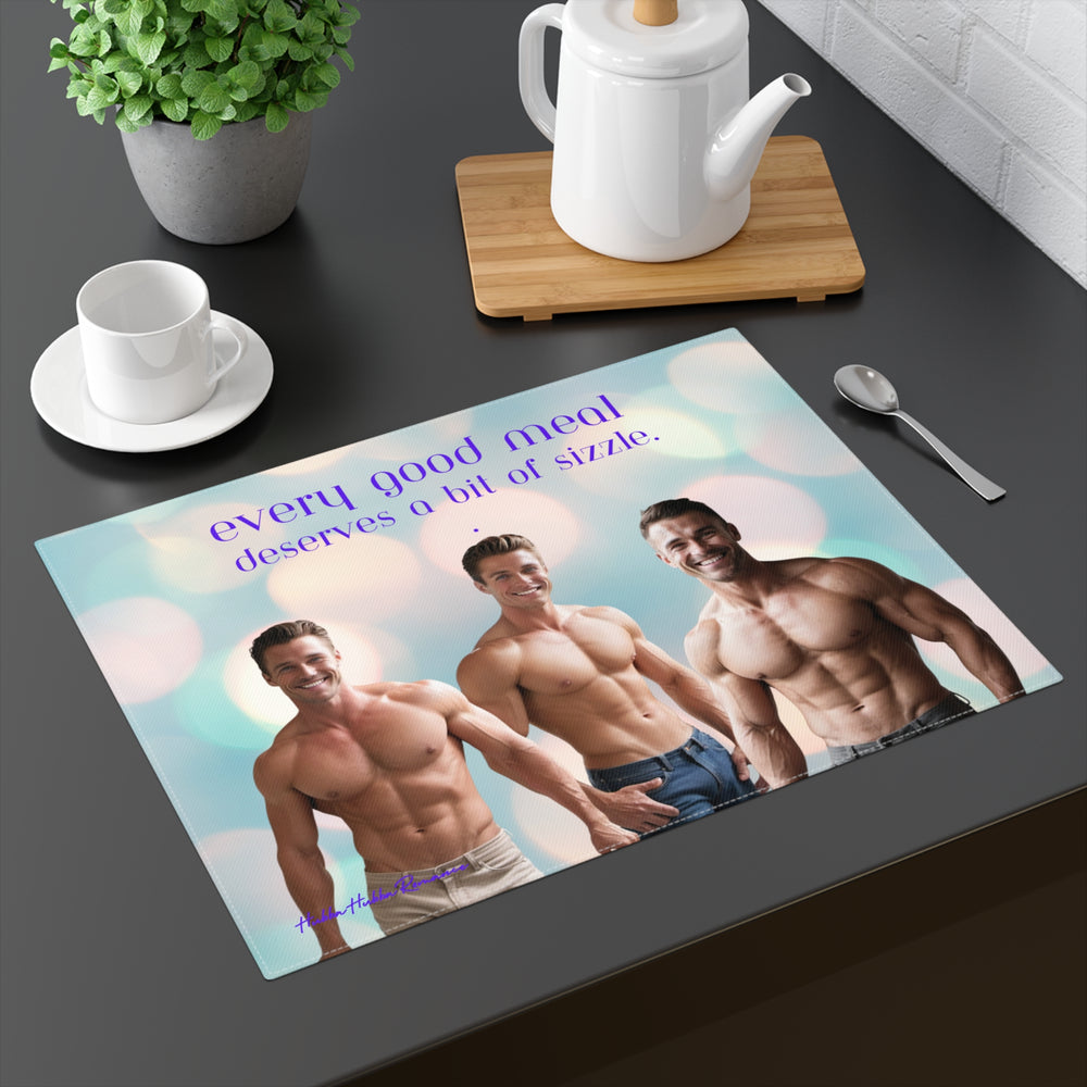 The placemat is displayed on a table with a cup and saucer, a teapot, a plant, and a spoon for context.

