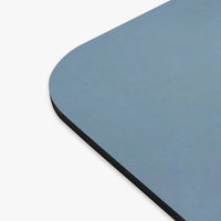 Picture showing close-up edge of mouse pad.
