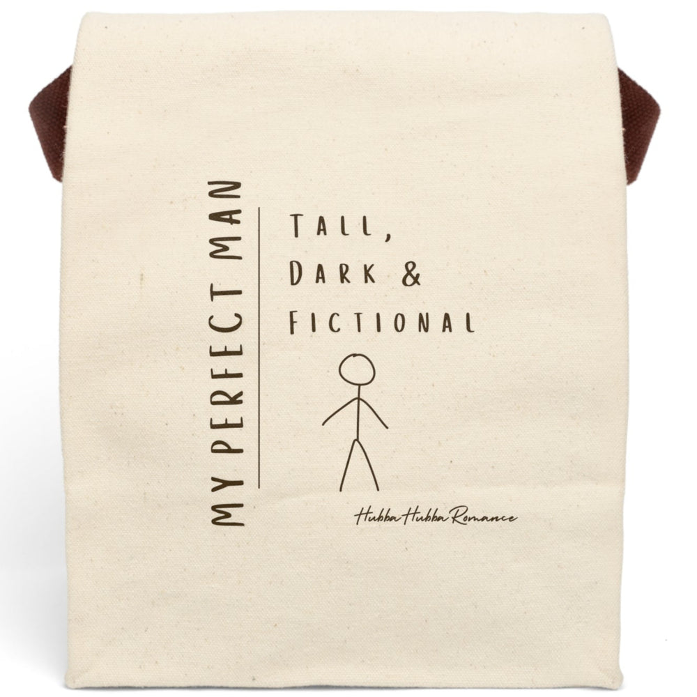 This canvas lunch bag features a minimalist, hand-drawn design on a plain canvas background. On the left, vertical text reads “MY PERFECT MAN.” To the right, in a casual handwritten font, it says: “Tall, Dark & Fictional.” Below the text is a simple brown stick figure drawing of a man. The design is playful and tongue-in-cheek. The bag includes a durable canvas body, roll-top enclosure, and strap—ideal for everyday use by book lovers and romance readers.