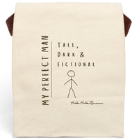 This canvas lunch bag features a minimalist, hand-drawn design on a plain canvas background. On the left, vertical text reads “MY PERFECT MAN.” To the right, in a casual handwritten font, it says: “Tall, Dark & Fictional.” Below the text is a simple brown stick figure drawing of a man. The design is playful and tongue-in-cheek. The bag includes a durable canvas body, roll-top enclosure, and strap—ideal for everyday use by book lovers and romance readers.
