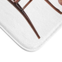 The corner of the mat is displayed to show the finished edges.