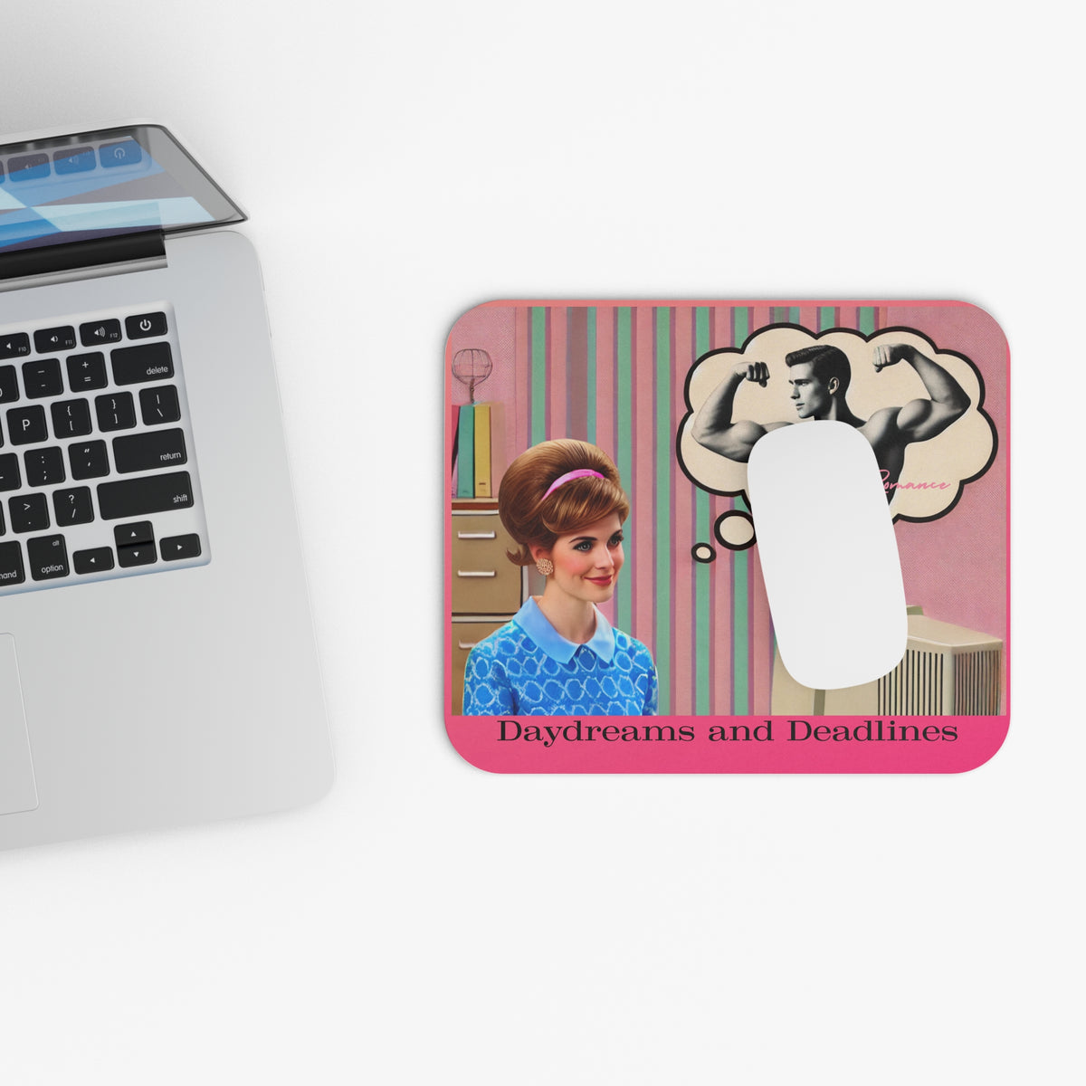 Picture showing mouse pad in relationship to keyboard for sizing reference.

