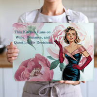 The cutting board is displayed upright  in the hands of a cook to give a sense of size. This is the larger version.