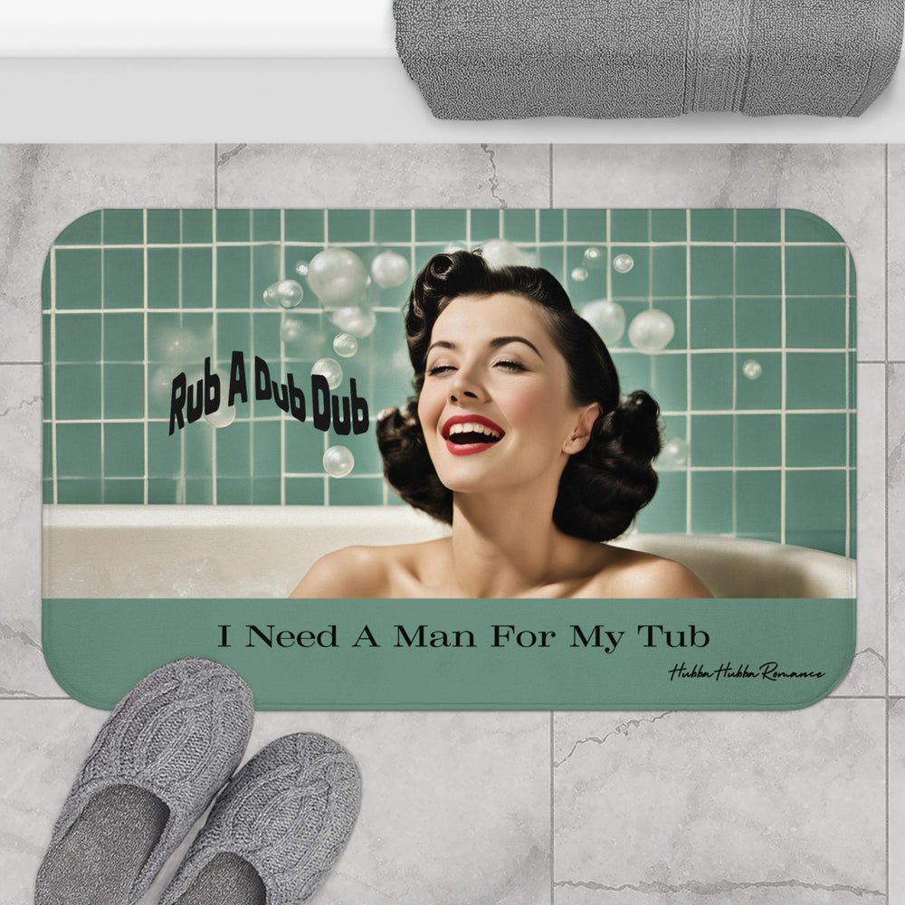 The bath mat is displayed next to a tub with a pair of slippers for size context.
