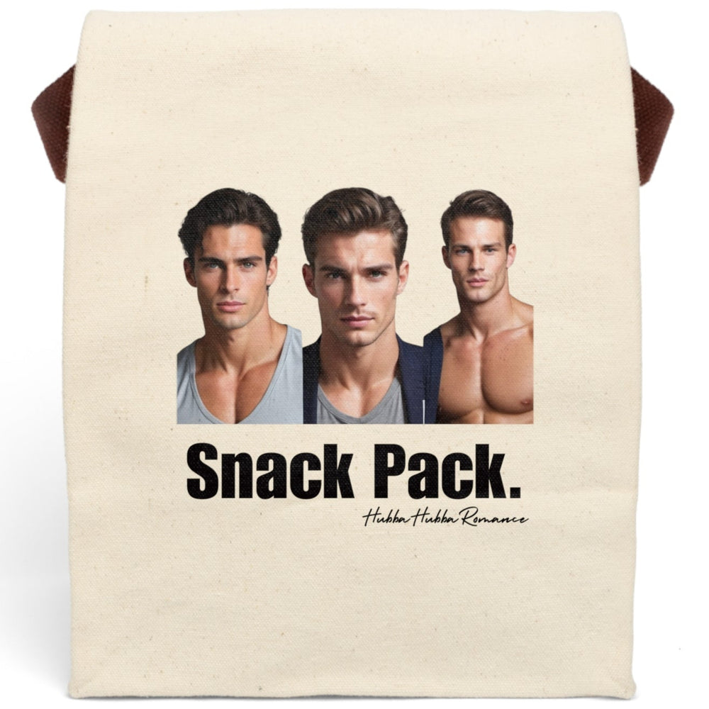 A plain canvas lunch bag features three handsome, muscular men standing side by side—styled like classic romance novel heartthrobs. One wears a snug gray T-shirt, one a blazer over a T-shirt, and the third is shirtless, showing off his sculpted chest. Beneath them, large bold text reads “Snack Pack,” cheekily implying these book boyfriends are today’s midday indulgence. The bag has a fold-over top, secure Velcro closure, and a sturdy handle for easy carrying. 