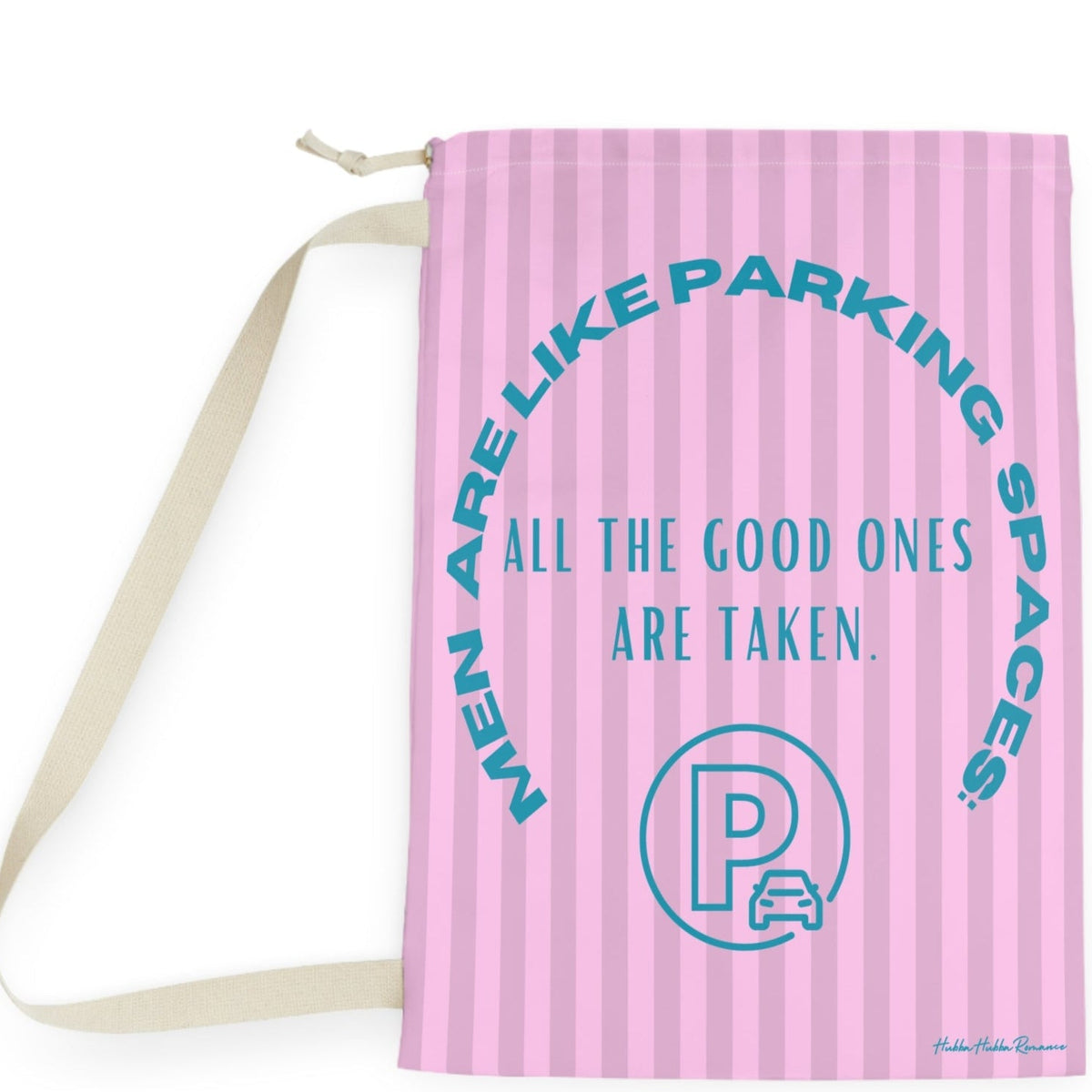 This laundry bag features a pink background with vertical pastel-pink stripes. Centered, bold, teal text reads: "All the good ones are taken." Above the text, in a large curved arc, it says: “Men are like parking spaces!” Below the quote is a parking symbol: a capital letter “P” inside a circle with a car icon in the corner. The bag includes a drawstring closure and a canvas carrying strap. The tone is playful, retro, and full of tongue-in-cheek charm. It is the large version.