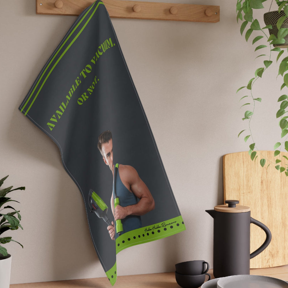 The towel is displayed on a wall hook in a kitchen setting.
