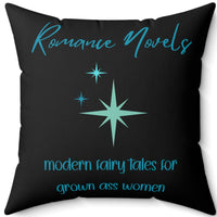 This 20" square pillow featuring a bold black background with elegant turquoise script at the top reading: "Romance Novels." Below, in a playful, modern font, the phrase "modern fairy tales for grown ass women" is displayed. To the left of the text, there are three vintage starbursts in varying sizes, adding a vintage-inspired, whimsical touch. The minimalist yet striking design conveys a love for romance books with a sassy, empowering attitude.