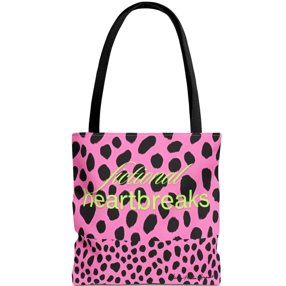 Image shows a pink background with bold, irregular black leopard spots. On one half of the image, the words “fictional heartbreaks” are written in light green cursive and block letters. Flipped upside down on the other half is the word “HEA” in matching green, also in mirrored script and block lettering. The design is playful and reversible, representing the highs and lows of romance reading. This double-sided tote is perfect for book lovers navigating love, loss, and happy endings.