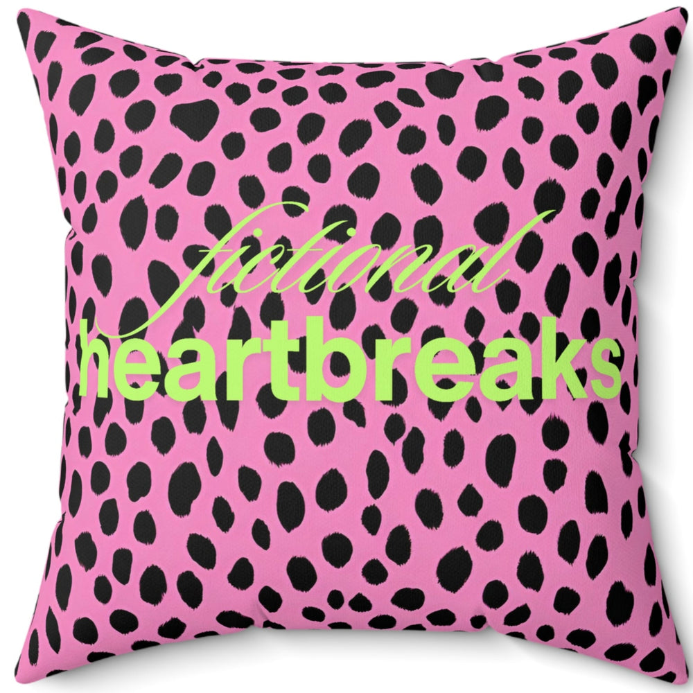 A 20-inch square pillow with a bold pink and black leopard print background. Across the center, the words “fictional heartbreaks” are written in stylish cursive and block lettering in neon lime- green. The vibrant design is playful and edgy, appealing to romance readers who love dramatic love stories. The back side of the pillow says "HEA”. The contrast of heartbreak and happy endings adds a witty, bookish touch.