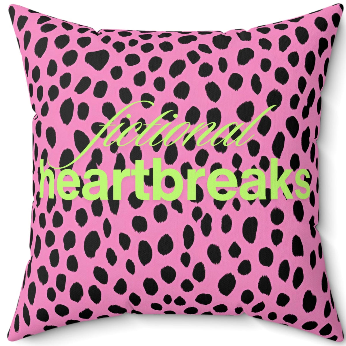 A 20-inch square pillow with a bold pink and black leopard print background. Across the center, the words “fictional heartbreaks” are written in stylish cursive and block lettering in neon lime- green. The vibrant design is playful and edgy, appealing to romance readers who love dramatic love stories. The back side of the pillow says "HEA”. The contrast of heartbreak and happy endings adds a witty, bookish touch.
