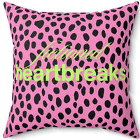 A 20-inch square pillow with a bold pink and black leopard print background. Across the center, the words “fictional heartbreaks” are written in stylish cursive and block lettering in neon lime- green. The vibrant design is playful and edgy, appealing to romance readers who love dramatic love stories. The back side of the pillow says "HEA”. The contrast of heartbreak and happy endings adds a witty, bookish touch.
