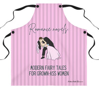 A pink striped apron with black straps and which features the phrase "Romance novels:" in elegant script, followed by "Modern fairy tales for grown-ass women" in bold lettering. Below the text, there is an illustration of a bride and groom in a dramatic dip, with the groom kissing the bride.

