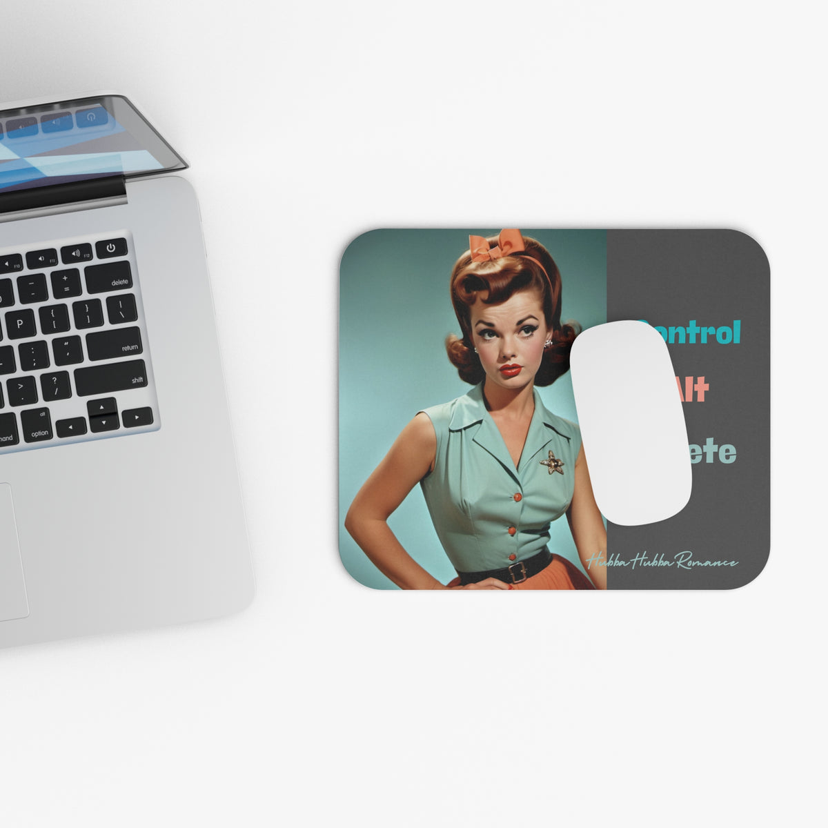 Picture showing mouse pad in relationship to keyboard for sizing reference.

