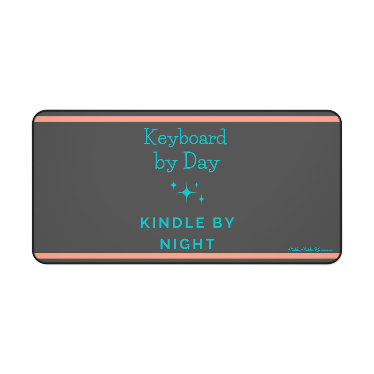 A charcoal gray desk mat features a playful message split across two lines: "Keyboard by Day" in turquoise serif text on the left, and "Kindle by Night" in sans-serif turquoise on the right. Turquoise starburst-style sparkles accent the design, and two thin orange horizontal lines run along the top and bottom edges. This is the largeversion.