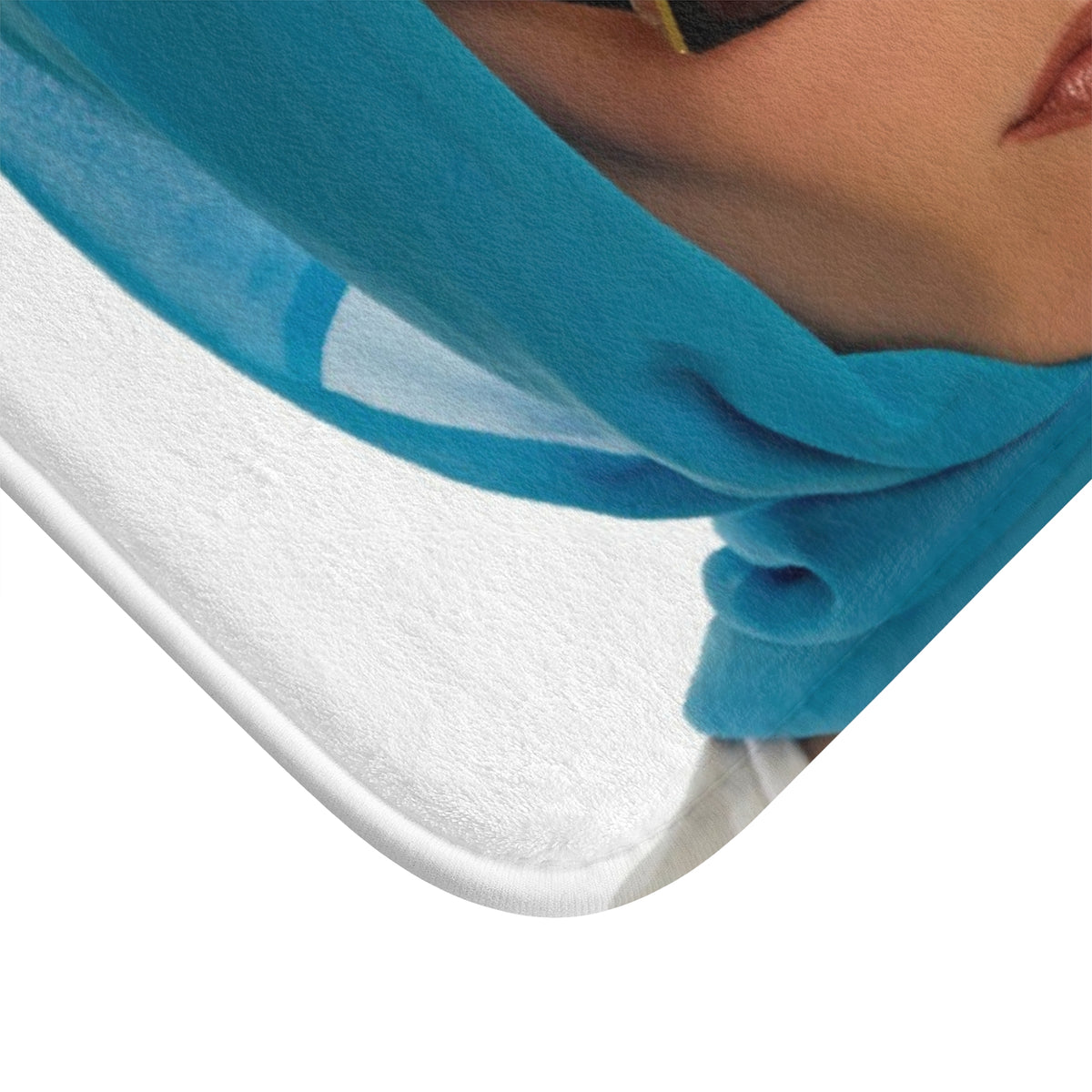 The corner of the mat is displayed to show the finished edges.
