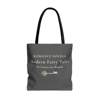 Gray tote bag with cream font that says Romance Novels. Modern Fairy Tales for Gown Ass Women. Unerneath the stacked text is a large ornate key to a castle.