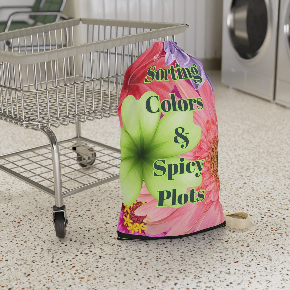 The laundry bag is displayed standing upright next to a laundry cart for sizing context. This is the smaller bag.