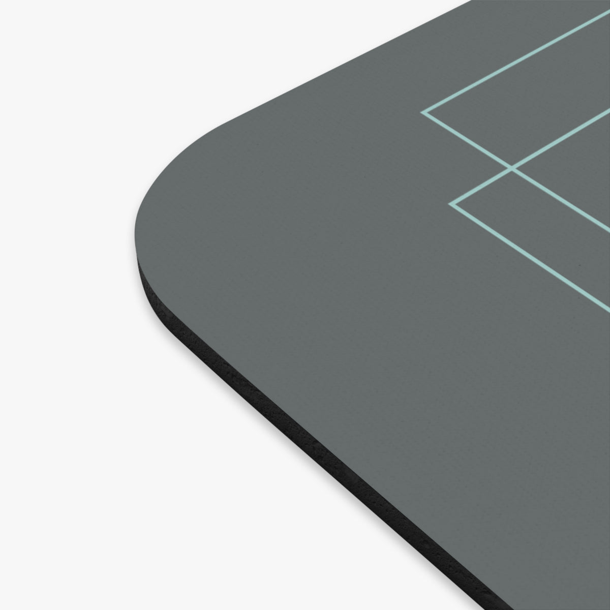 Picture showing close-up edge of mouse pad.
