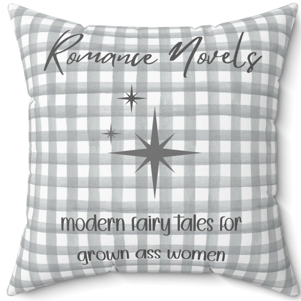 A 20-inch pillow featuring a gray and white gingham background with elegant script text that reads: "Romance Novels." Below, in a playful handwritten-style font, the phrase "modern fairy tales for grown ass women" is written. To the left of the text, there are three gray starbursts, adding a touch of vintage charm. The overall design is minimalist yet bold, appealing to romance readers who embrace their love for modern-day fairy tales.
