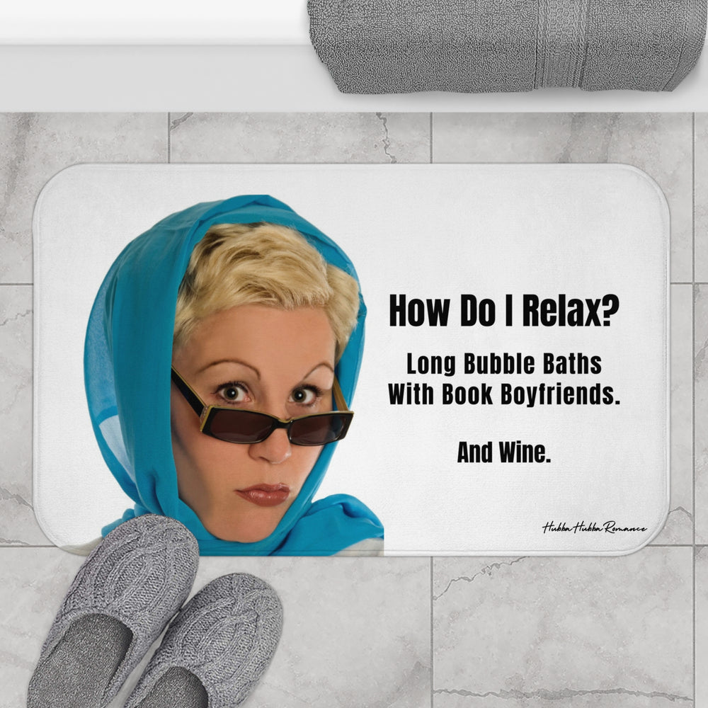 The bath mat is displayed next to a tub with a pair of slippers. 

