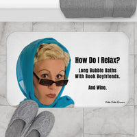 The bath mat is displayed next to a tub with a pair of slippers. 


